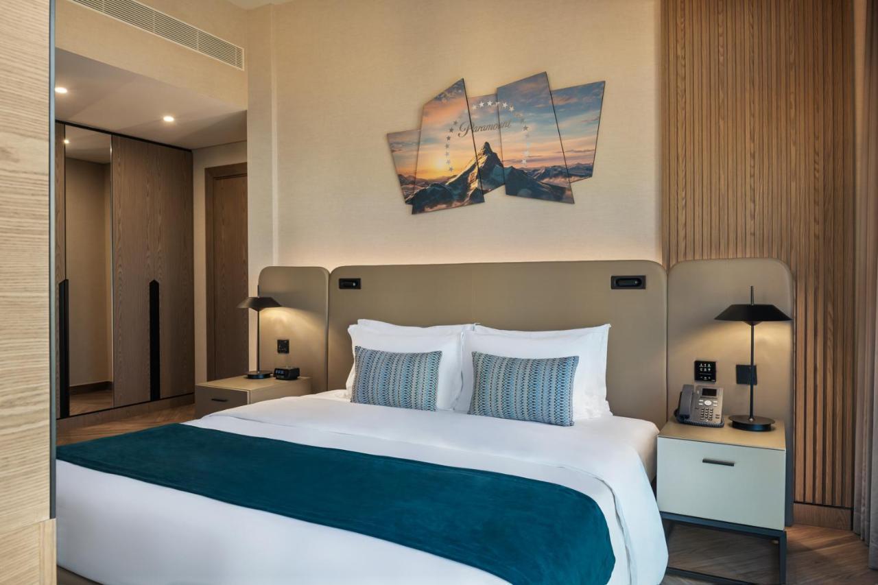 Paramount Hotel Midtown Dubaj Kültér fotó A bedroom at the hotel